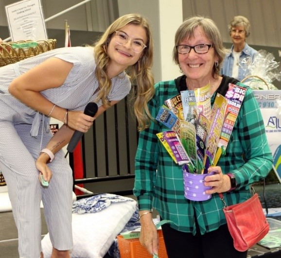 Katie presenting Bev her prize at the Apsley Casino night
